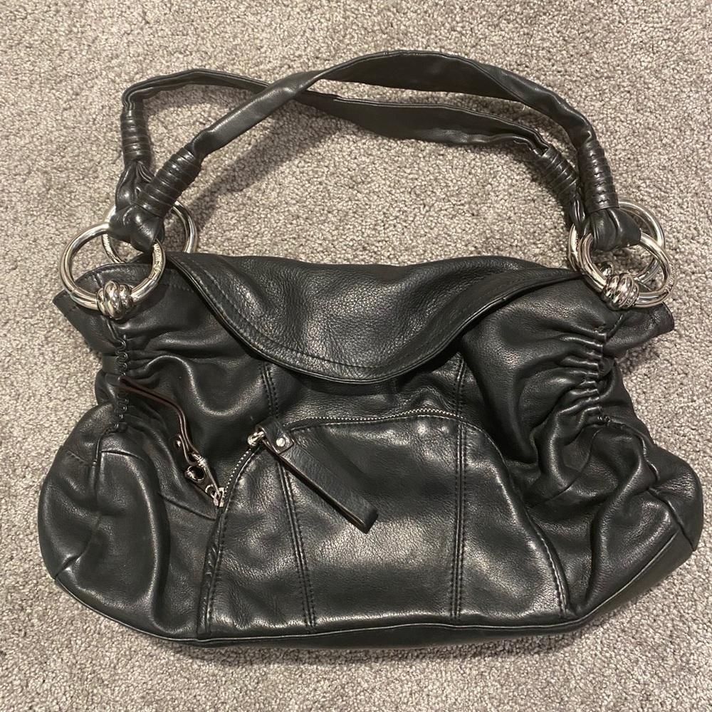 B. Makowsky leather purse.